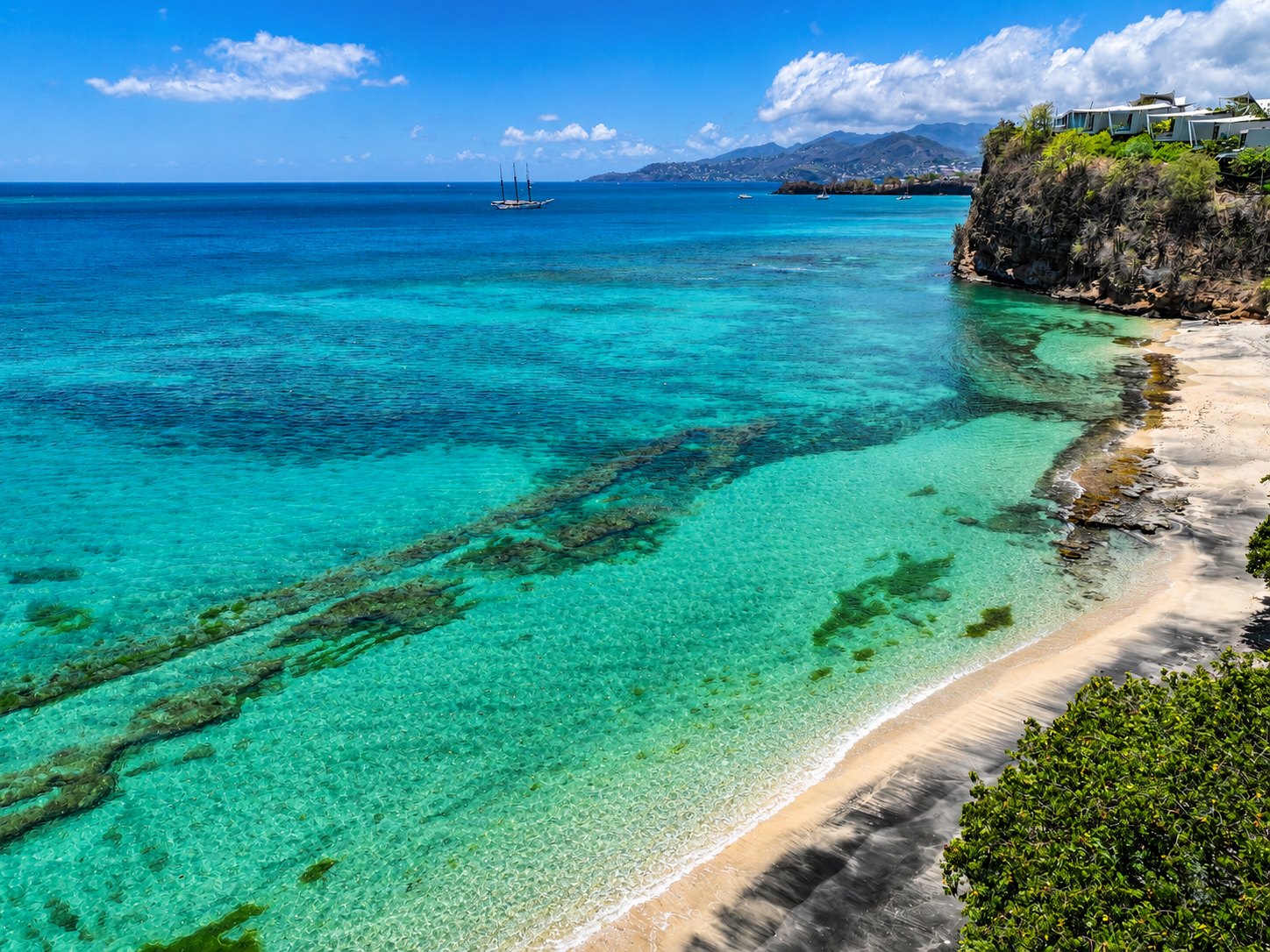David Roberts aerial photograph of a coastline and turquoise water